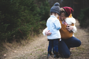 women with one kid one baby photo